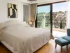 Elite_junior_villa_master_bedroom.webp